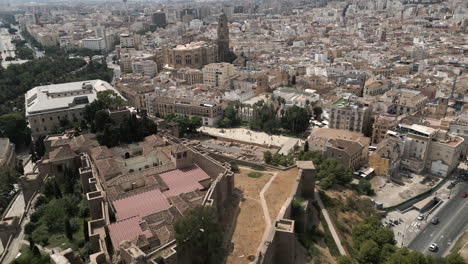Drone-Shot-Coming-Over-Old-Ruins-in-Malaga,-Spain