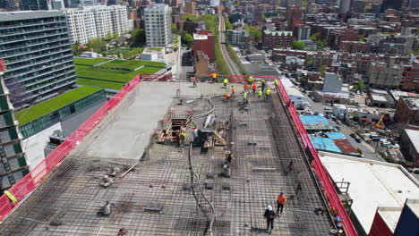 Aerial-shot-of-a-highrise-building-being-constructed-with-the-concrete-being-poured