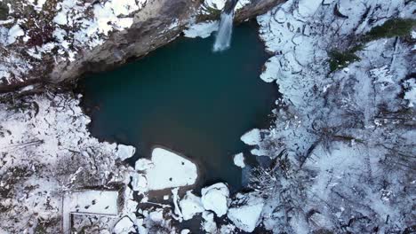 Aerial-Drone-Shot-of-Waterfall-in-Snowy-Winter-in-Turkey---Drone-Reveal