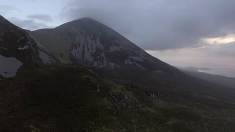 Aerial-view-of-the-famous-mountain-Croagh-Patrick-on-a-foggy-evening