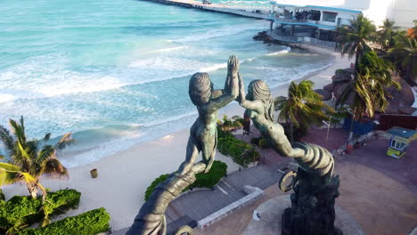 Aerial-point-of-interest-of-the-Mayan-Portal-Monument-in-the-Mayan-Riviera,-Mexico-during-sunset