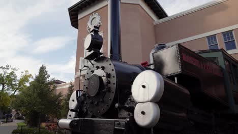 Shot-of-an-old-steam-train-engine-museum-piece-located-at-the-Broadmoor-Hotel-in-Colorado-Springs-Colorado