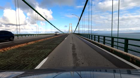 Driving-over-Mackinaw-Bridge-in-Michigan,-point-of-view
