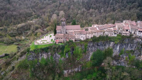Aerial-view-of-the-village-of-San-Felíu-de-Guixols-on-top-of-a-rocky-formation-in-Catalonia-Spain