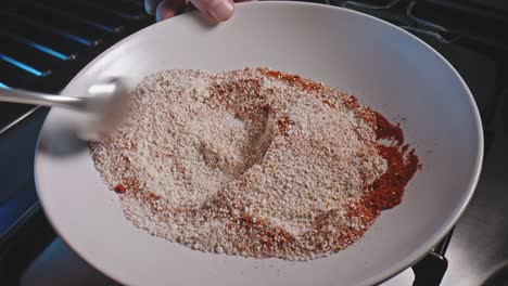 Preparing-seasoning-mix-by-hand