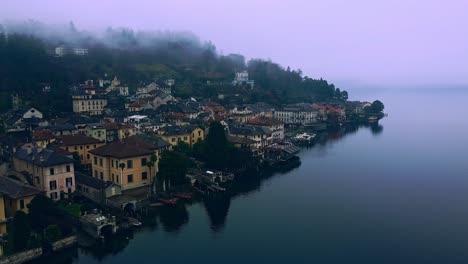 Drone-Shot-of-settlement-city-in-Orta-San-Giulio-by-Lake-Orta-in-Italy