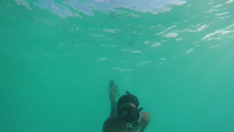 Snorkeling-in-the-Clear-Aqua-Blue-Sea-of-the-Maldives