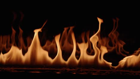 Slow-Motion-gas-powered-flames-flicker-from-a-luxury-gas-fire-place