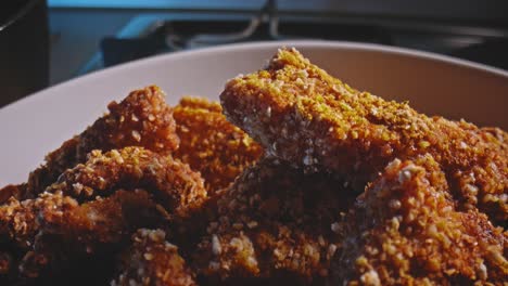 Closeup-bowl-of-homemade-organic-tasty-crispy-chicken-nuggets-ready-to-eat