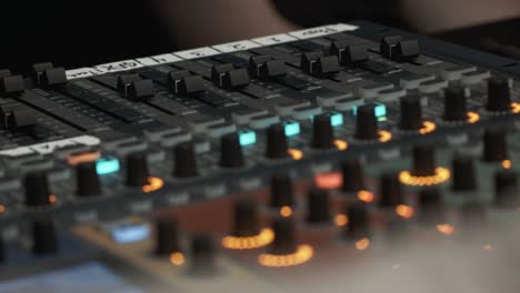 Static-image-of-lights-and-knobs-on-a-sound-mixer-digital-board