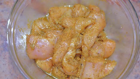 Cooking-chicken.-Process-marinated-chicken-legs-in-sauce