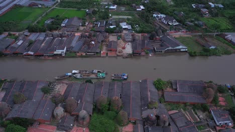 Aerial-view-of-brick-kilns-and-canal-in-Vinh-Long-in-the-Mekong-Delta,-Vietnam