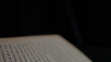 blurred-open-page-of-a-book-slightly-out-of-focus,-creating-a-soft-and-hazy-effect-suggesting-a-dreamlike-or-abstract-state