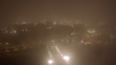 Misty-night-sky-over-the-city-of-Salamanca,-Spain