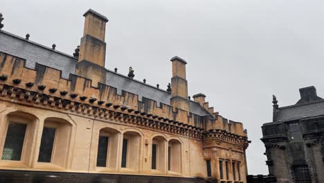 Close-panning-shot-of-the-beautiful-sandstone-buildings-at-the-courtyard-of-Stirling-Castle
