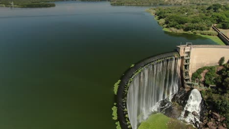 Drone-aerial-footage---Dam-wall-water-spilling-over-with-waterfall