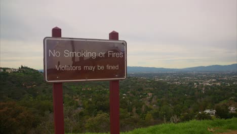 No-smoking-sign-with-Los-Angeles-in-the-back-ground