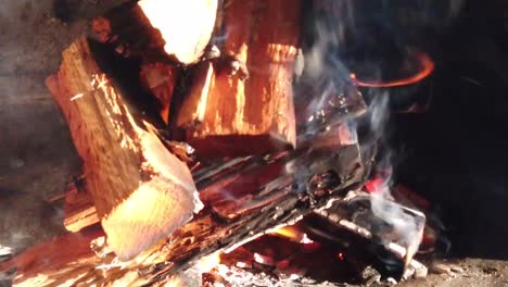 Wood-Burning-Fire-preparing-for-a-BBQ-on-a-game-farm