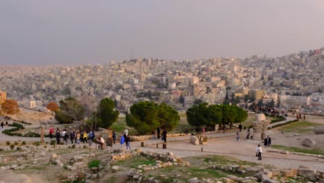 Busy-day-with-tourist-walking-around-Amman-Citadel-archeological-historical-site,-Jabal-al-Qalaa,-tourism-landmark-in-capital-city-of-Jordan