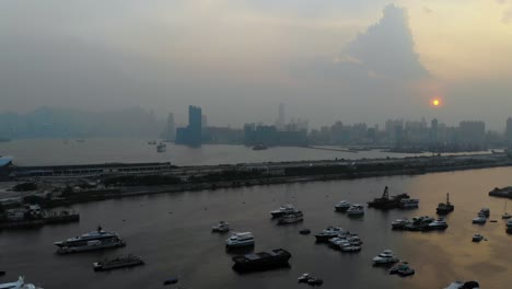 Drohne-Geschossen-über-Kowloon,-Hong-Kong-Mit-Sonnenuntergang