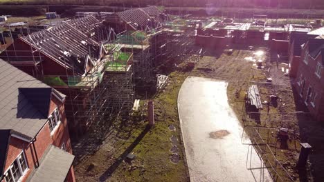 Abandoned-Cheshire-townhouse-property-development-framework-on-builders-construction-site-aerial-view
