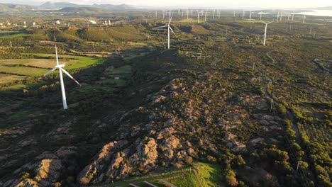 Establisher-aerial-of-green-industry-landscape-with-Wind-Turbines-and-Solar-farm