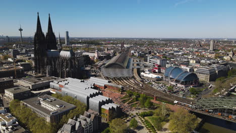 Aerial-slide-display-Cologne-Central-Station-amidst-Cathedral-Germany