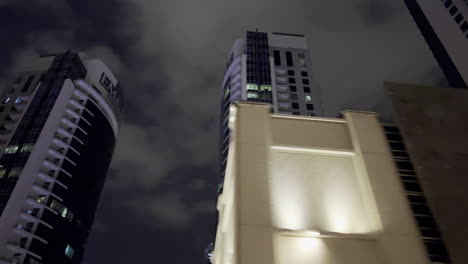 Parallax-shot-of-a-building-in-Dubai-City-at-night