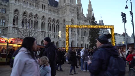Christmas-village-opposite-Vienna-town-hall-as-crowds-gather-during-the-daytime