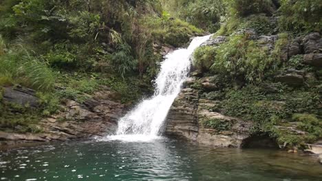 Small-Stunning-Vietnamese-Waterfall-stream-in-a-Vibrant-Jungle-Environment