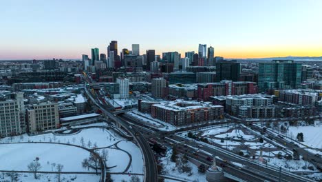 A-dynamic-hyperlapse-aerial-footage-drifting-from-the-Interstate-25-highway-towards-the-city-of-Denver-in-Colorado