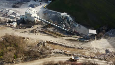The-Process-of-Lime-Production-,-an-Aerial-View-of-a-Limestone-Quarry-and-its-Heavy-Equipment