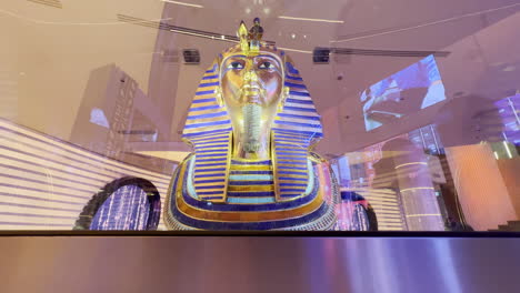 Ancient-Pharaoh-coffin-head-seen-through-the-glass-at-Egypt-pavilion-EXPO-Dubai