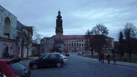 Walking-on-Cobblestones-in-Weimar-Old-Town-With-View-to-City-Palace