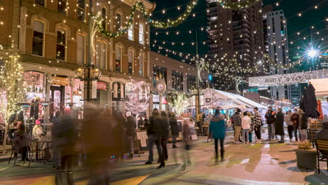 Time-lapse-of-people-walking-through-Denver's-Larimer-Square-on-a-winter's-night