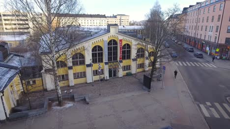 Aerial-view-of-Kulttuuritehdas-Korjaamo-Culture-Factory-and-Ratikkamuseo-on-a-sunny-winter-day