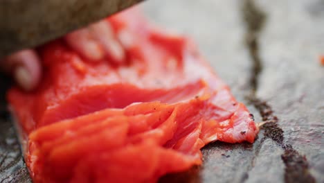 Cutting,-cleaning,-and-gutting-a-wild-salmon-with-a-knife