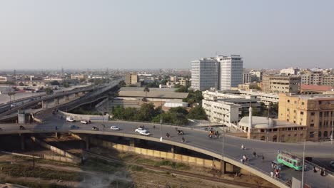 Aerial-View-Of-Jinnah-Bridge-And-Flyover-Over-Rotary-Food-Park-In-Karachi