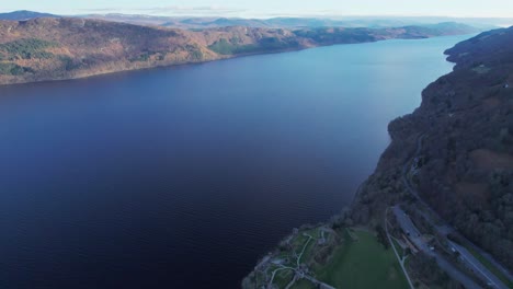 Loch-ness-drone-aerial-near-Urquhart-Castle-Scotland-historic-lake-in-the-Scottish-Highlands,-clan-wars