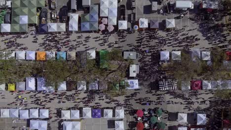 4K-Aerial-Drone-Video-of-Shoppers-at-Farmers-Market-in-Downotwn-St