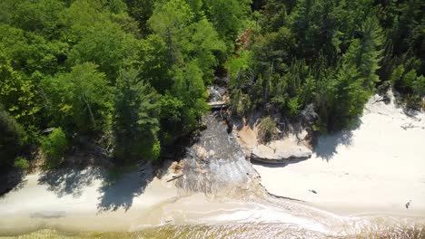 Aerial-of-Beach-and-Chapel-Beach-Falls,-Pictured-Rocks-National-Lakeshore,-Munising,-Michigan