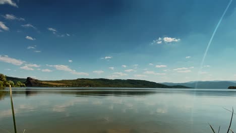 beautiful-timelapse-of-a-lake-with-clear-sky-and-blue-water