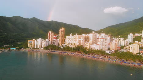 Aerial-view-of-Rodadero-beach-and-beautiful-rainbow