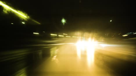 Hyperlapse-of-a-drive-through-Los-Angeles-on-a-rainy-night---abstract