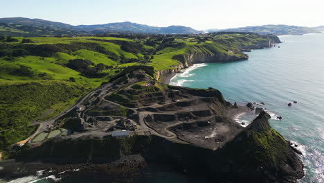 Aerial-view-on-working-Blackhead-quarry-on-coast-of-South-Island,-New-Zealand