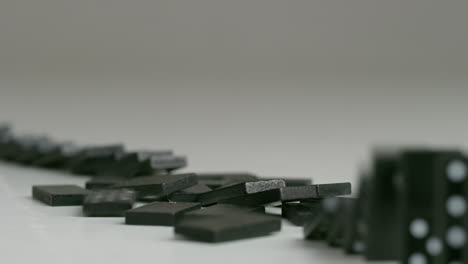 rows-of-black-dominoes-with-white-dots