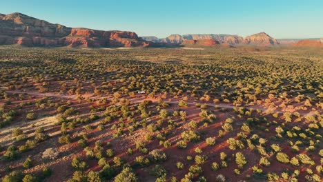 Aerial-View-Over-Bushes-Growing-On-The-Deserts-Of-Sedona-In-Arizona---drone-shot