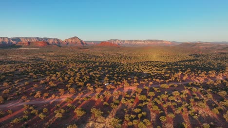 Sedona-Nature-Landscape-With-Campervan-Parked-On-The-Campsite-In-Arizona,-USA---aerial-drone-shot