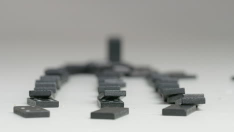 three-rows-of-black-dominoes-with-white-dots