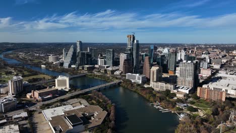 Aerial-view-of-the-river-and-the-skyline-of-Austin,-sunny-fall-day-in-Texas,-USA